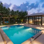 Sunlit Splendour By Stayvista Near Nagaon Beach Boasting An Outdoor Pool And Modern Chic Interiors